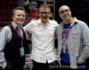 My jovial neighbours Andrew and Mike pose with me in front of their table